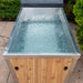Dundalk Leisurecraft Canadian Timber The Polar Plunge Tub The Polar Plunge Tub is the perfect size for partial or full submerge cold plunge therapy and can be used inside or outside your home. This aluminium lined cold plunge tub comes with an easy to use floor drain and optional roll up cover to keep the ice water clean from debris. Boost your energy with this 71″x33″ cold plunge tub that has white cedar skirting around the outside to compliment your Canadian Timber Sauna.