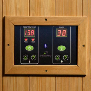 Dynamic Gracia 1-2-person Low EMF (Under 8MG) FAR Infrared Sauna (Canadian Hemlock) DYN-6119-01 by Golden Designs Dynamic Saunas are constructed of environmentally-friendly Canadian Hemlock wood planks. Our saunas feature energy efficient Low EMF FAR infrared heating panels that help relax and rejuvenate the body. Dynamic Saunas can be installed on carpet or any indoor location including basements, master bath, walk in closet or can also be added it to a fitness room.