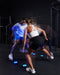 The FITLIGHT® system is a wireless LED lights system designed for elite reaction and cognitive training. Patented sensors register both impact (touch) and motion. Lights are incredibly durable and flexible, and the system can be used indoors or outdoors up to 50M-75M away from the device. Accessories include velcro attachments, charging cables, and a carrying bag for portability. Operated with a subscription-free App, users can customize and choose from over 30 preprogrammed drills in 8 categories