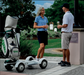 This is the NEW 2023 Golf Skate Caddy (GSC) Tourer. After the success of the V3, GSC followed up with the Tourer Model that stands in a more traditional forward stance as opposed to the "skateboard style" V3. Not only is it fun to ride but golfers of all ages will experience a faster-paced game. The GSC TOURER™ rider can ‘ride the turf’ cruising to their own ball, without having to wait for their co-player as in a traditional golf cart. 