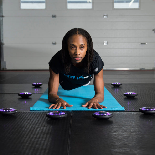 The FITLIGHT® system is a wireless LED lights system designed for elite reaction and cognitive training. Patented sensors register both impact (touch) and motion. Lights are incredibly durable and flexible, and the system can be used indoors or outdoors up to 50M-75M away from the device. Accessories include velcro attachments, charging cables, and a carrying bag for portability. Operated with a subscription-free App, users can customize and choose from over 30 preprogrammed drills in 8 categories