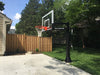 Ironclad 54" Triple Threat Adjustable Height  Basketball Hoop TPT553-MD  The Ironclad Triple Threat TPT553-MD basketball system is the best combination of durability and affordability of any of the Ironclad adjustable goals. This unit fits any driveway or downsized backyard court perfectly. It's 54" wide backboard is wide enough to accommodate any angle bank shot. The heavy duty H-Frame backboard support eliminates risk of backboard breakage from hanging on the rim.
